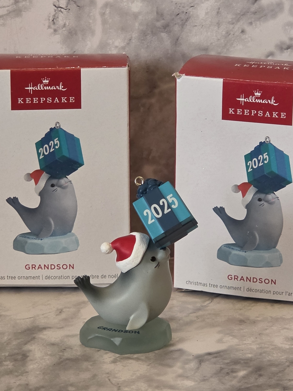 Hallmark Keepsake - Grandson Seal Ornament with Red Santa Hat and Blue 2025 Gift